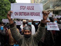 I Rifugiati Eritrei Protestano Davanti All'ufficio Dell'UNHCR Ad Addis Abeba Lo Scorso Anno Dopo Gli Attacchi Ai Rifugiati In Due Campi. Fotografia: Tiksa Negeri/Reuters